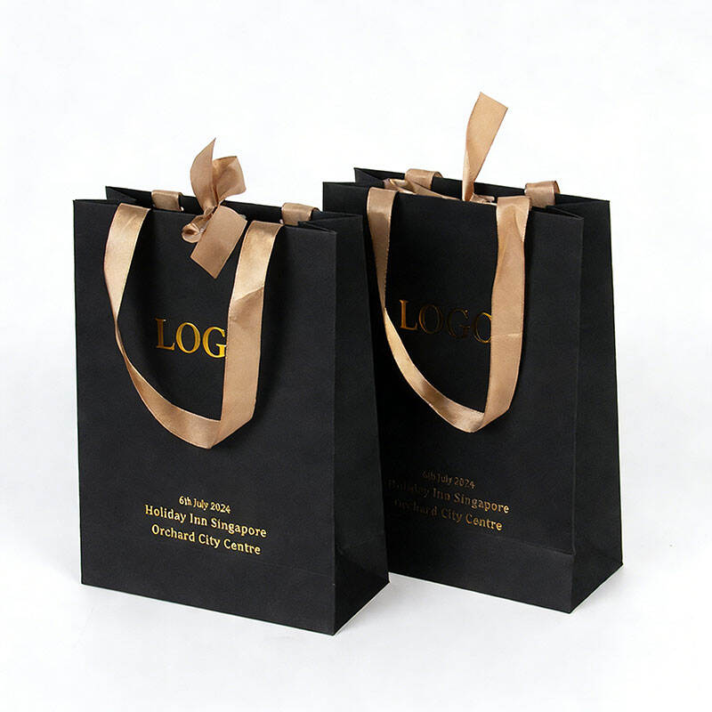 Aangepaste Logo Gedrukte Luukse Hoë en Wit Groothandel Linthandvatsel Geskenk Juwele Aangepaste Luukse Inkopiesakke met Logos