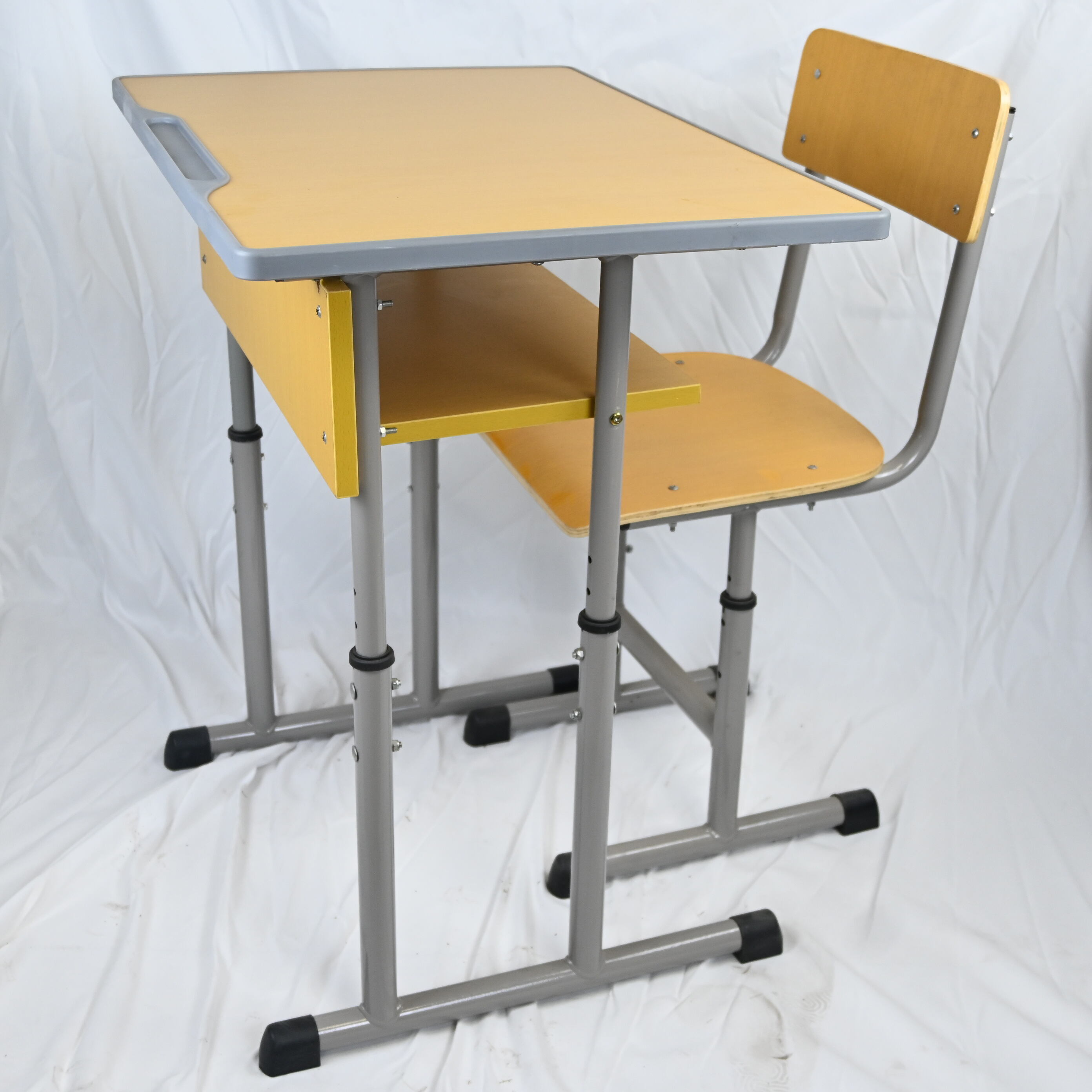What materials make school desks and chairs both durable and eco-friendly?