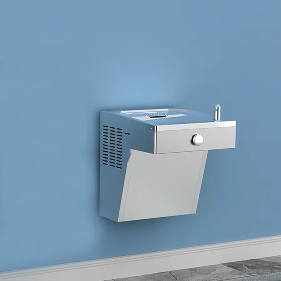 What safety standards should a drinking fountain meet in public facilities?