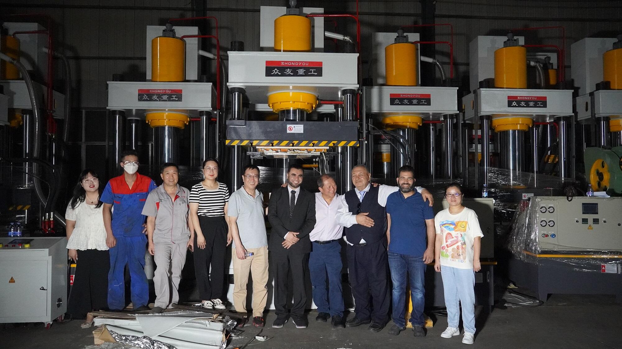 Ghanaian customers came to  inspect their manhole cover hot-pressing hydraulic press.