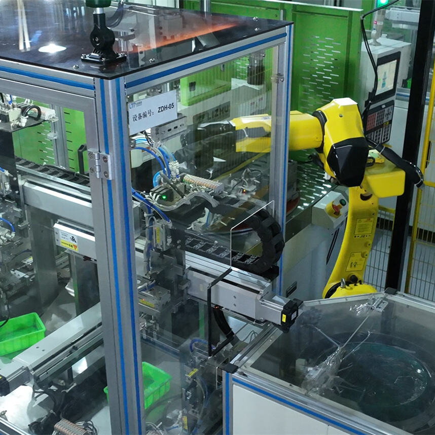 Kézi betöltéstől a teljes automatizálásig: A függőleges fröccsöntő gyártósorok fejlesztése