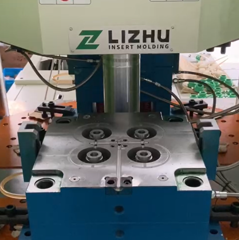 Rotary table vertical injection molding machine for pipe connector