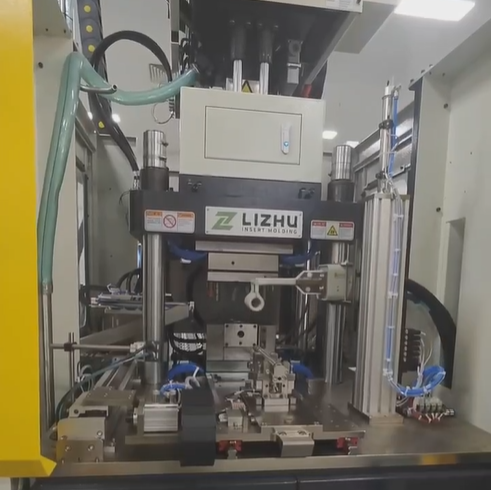 Hybrid vertical injection molding machine, electric injection unit. For handle
