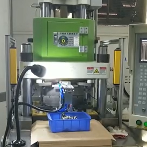 Vertical injection molding machine with fixed table for Electronic parts