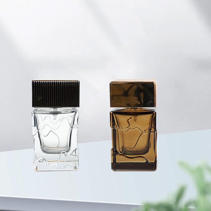 Manufacturers wholesale 50ml square luxury transparent spray glass perfume bottle with plastic cap