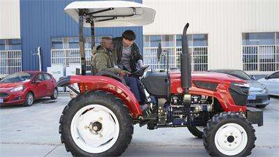 American customers visit the factory to test drive tractors