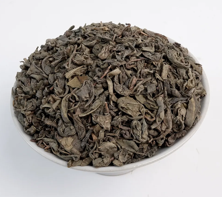 What are the key properties of tea leaves for commercial processing?
