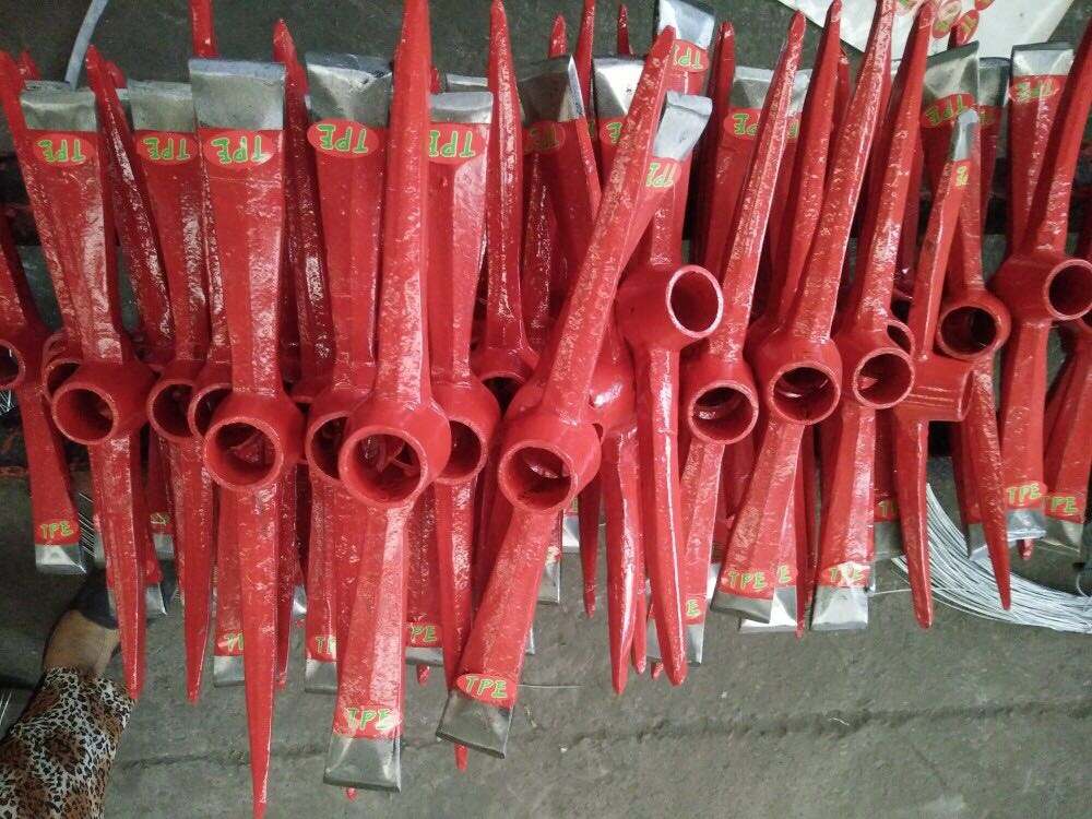 Pickaxe: Heavy-Duty Hand Tool for Breaking Hard Surfaces