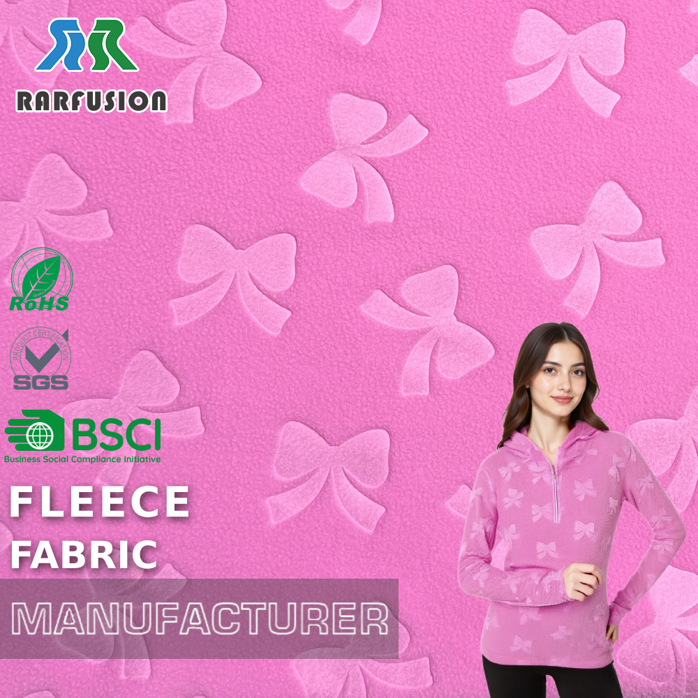 100% Polyester Pink Bow Embossed Polar Fleece Fabric for Loungewear Hoodies Kids Wear