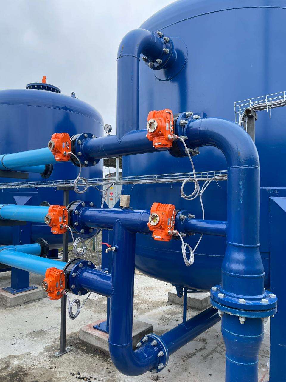 How do electric valves support engineering project cost control?