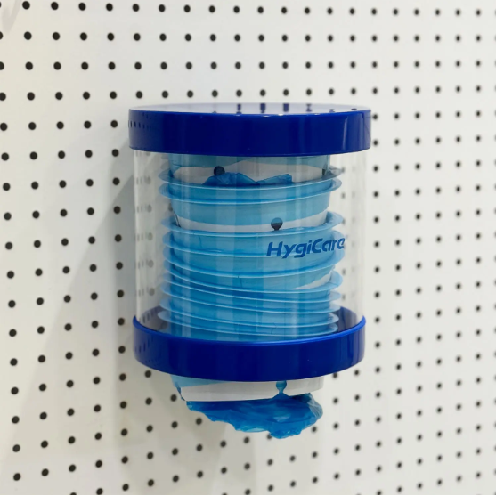 What is the Purpose of a Vomit Bag Dispenser in Healthcare Settings?