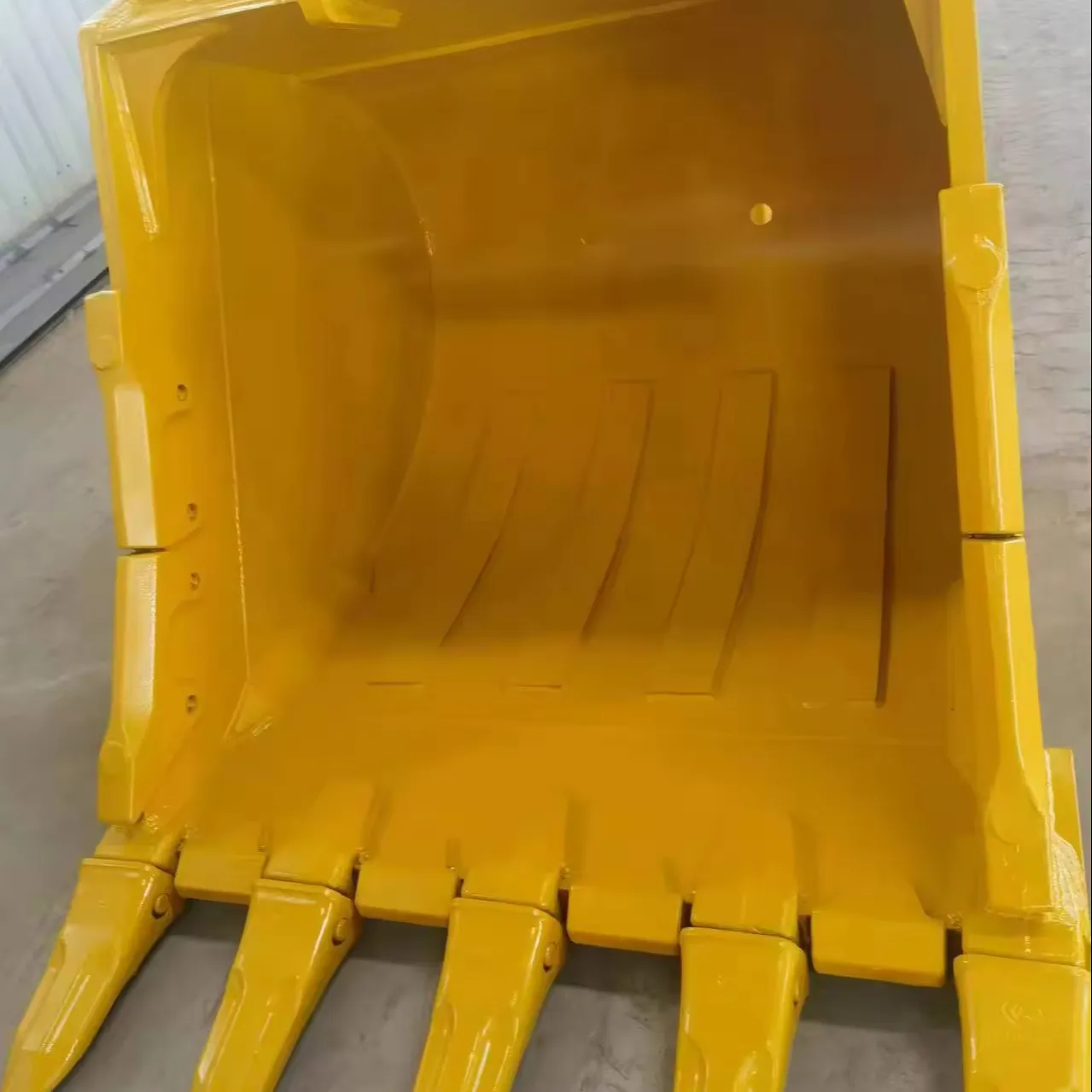 What are the different types of excavator buckets available for various applications?