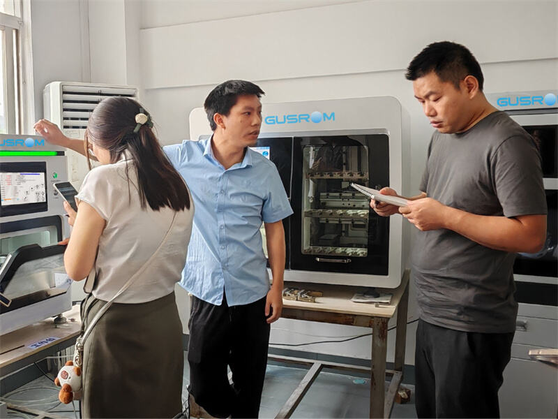 Gusrom staffs in dental machine operation training.jpg