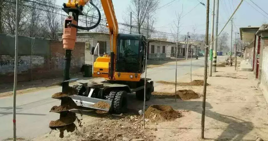 The wonderful use of auger and screening bucket in garden construction