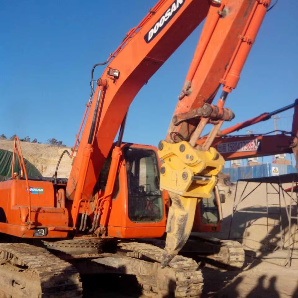Versatile Excavator with Multiple Attachments Dig, Lift, and Demolish with One Machine!