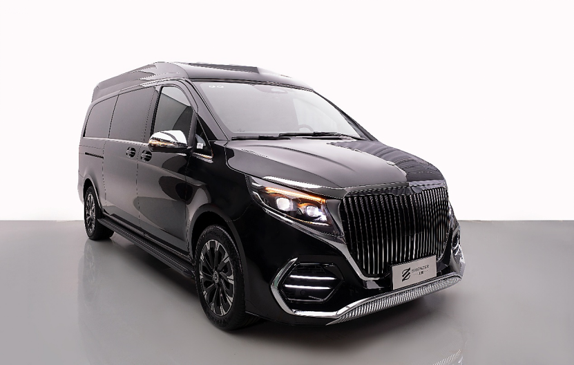 Exterior view of a luxury business van showcasing premium design and branding.