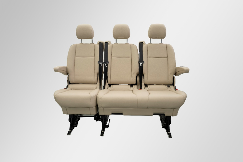 A set of three connected seats customized for a luxury business vehicle.