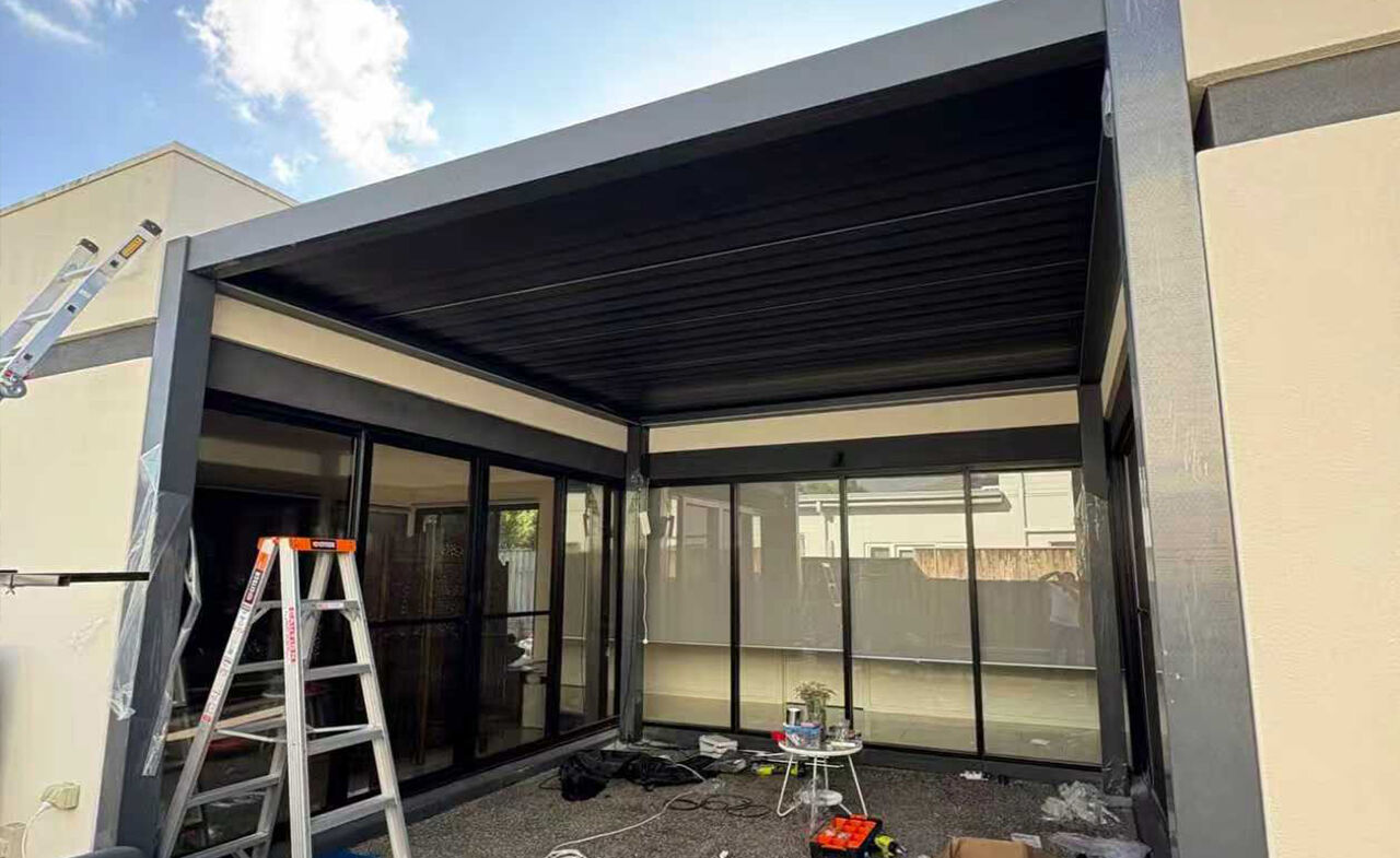 Eco Pergola Creates Functional Living Space Between Two Buildings