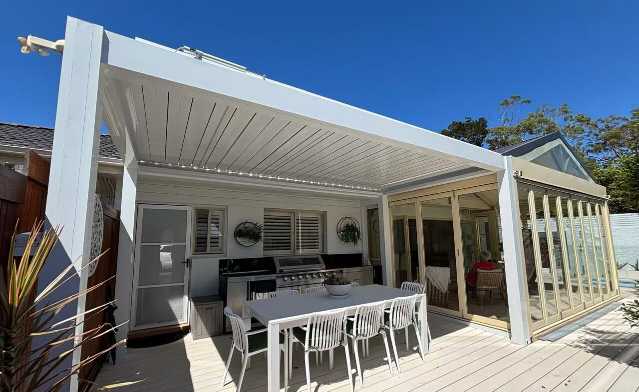 Pergola Creates Extended Outdoor Kitchen Space for Sydney Home