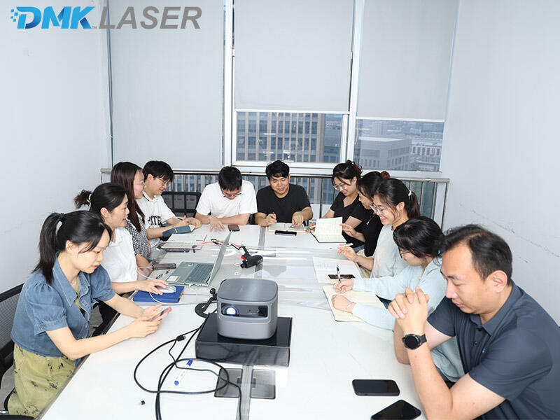 DMK factory internal training on new handheld welding head