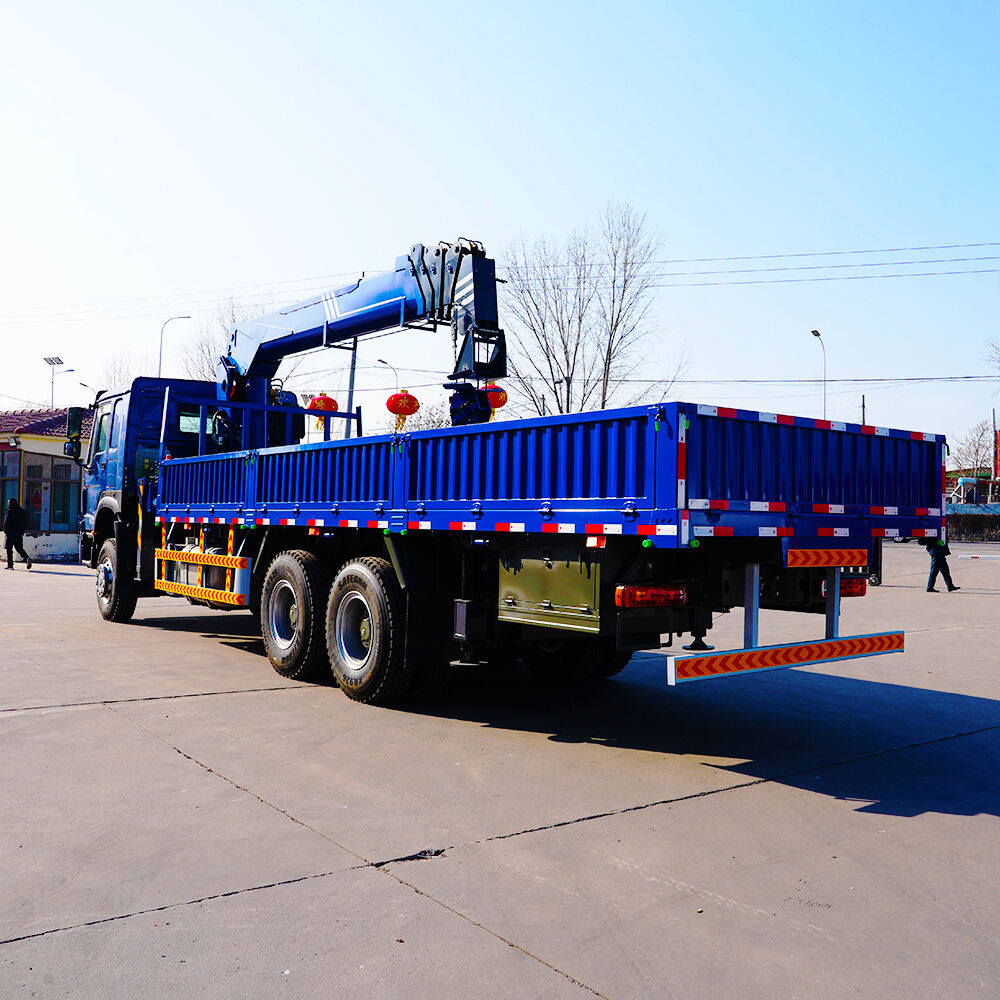 kran Imborsat fuq Kamjun ta' 14Ton HOWO 6X4