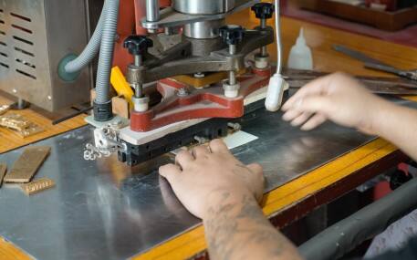 Hotel guest rooms amenities Production Workshop, showcasing the process of crafting leather products for your hotel