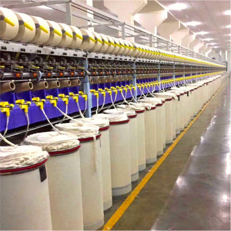 Industrial spinning and raw yarn processing machinery at Taitang textile factory for hotel linen production.png
