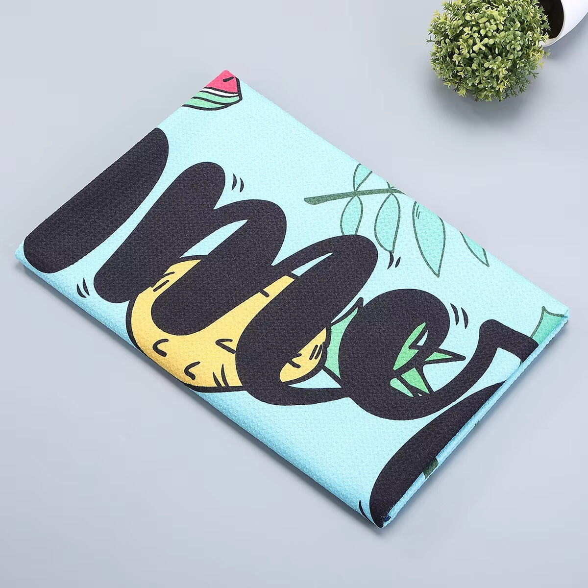 What are the benefits of antimicrobial treatment in beach towels?