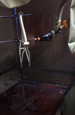 automated electrostatic spraying of bicycle frames-3