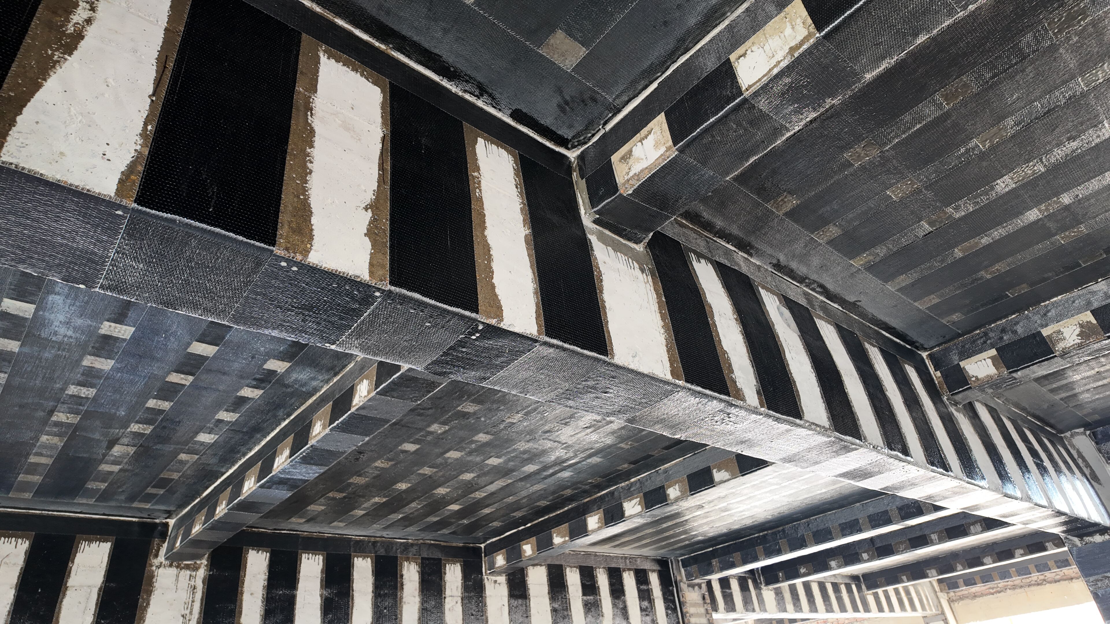 Can Carbon Fiber cloth, Thin as Cicada Wings, Truly Reinforce Buildings and Bridges? Unveiling the 