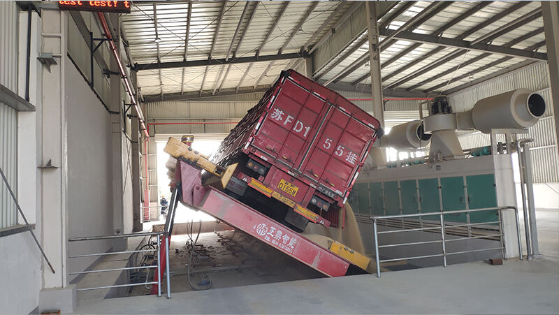 Rollover truck dumper