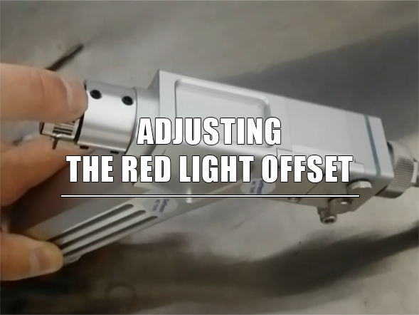 Adjusting the red light offset on a handheld laser gunhead