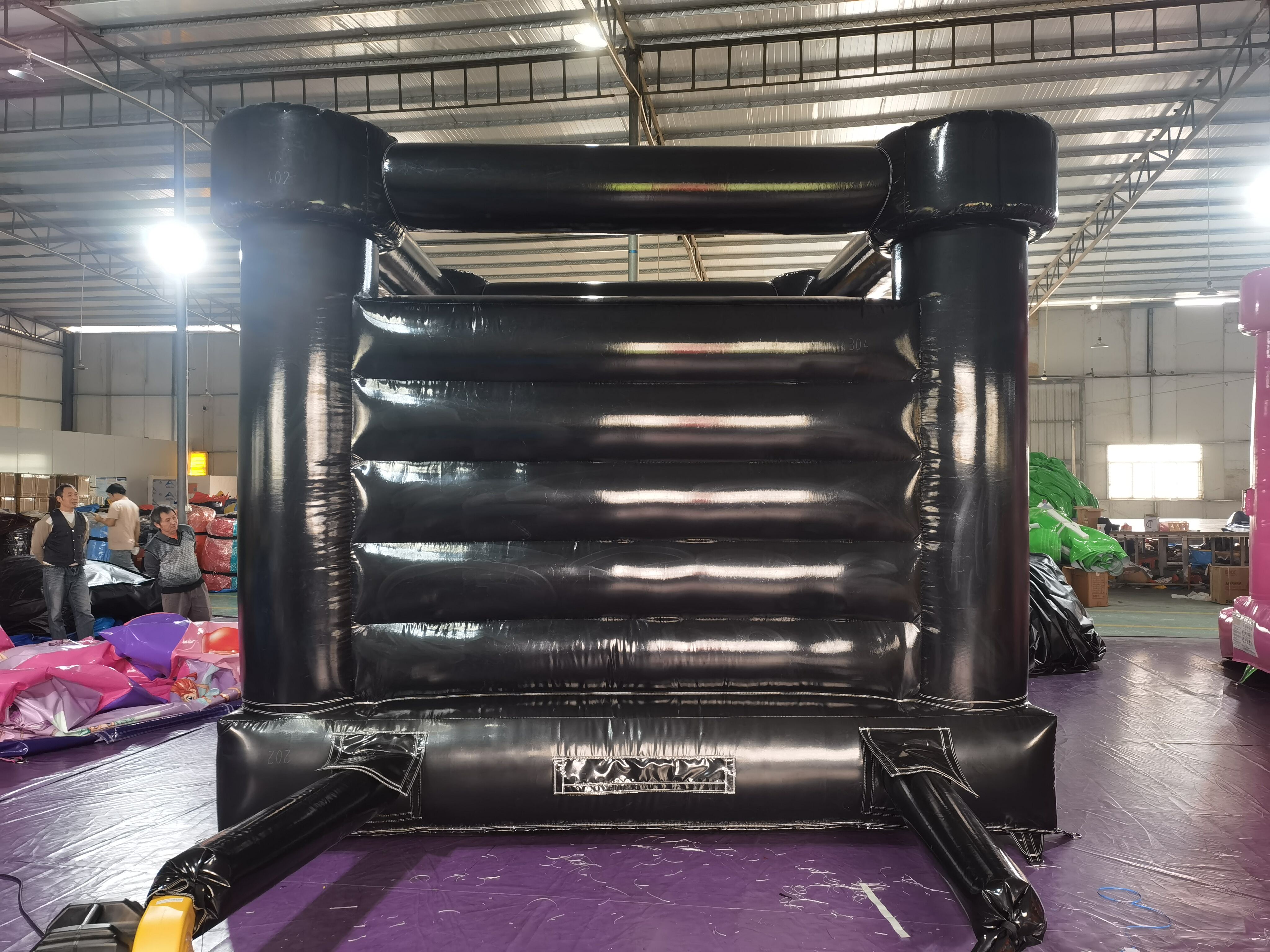 High-End Black Themed Inflatable Bounce House for Intimate Wedding Gatherings