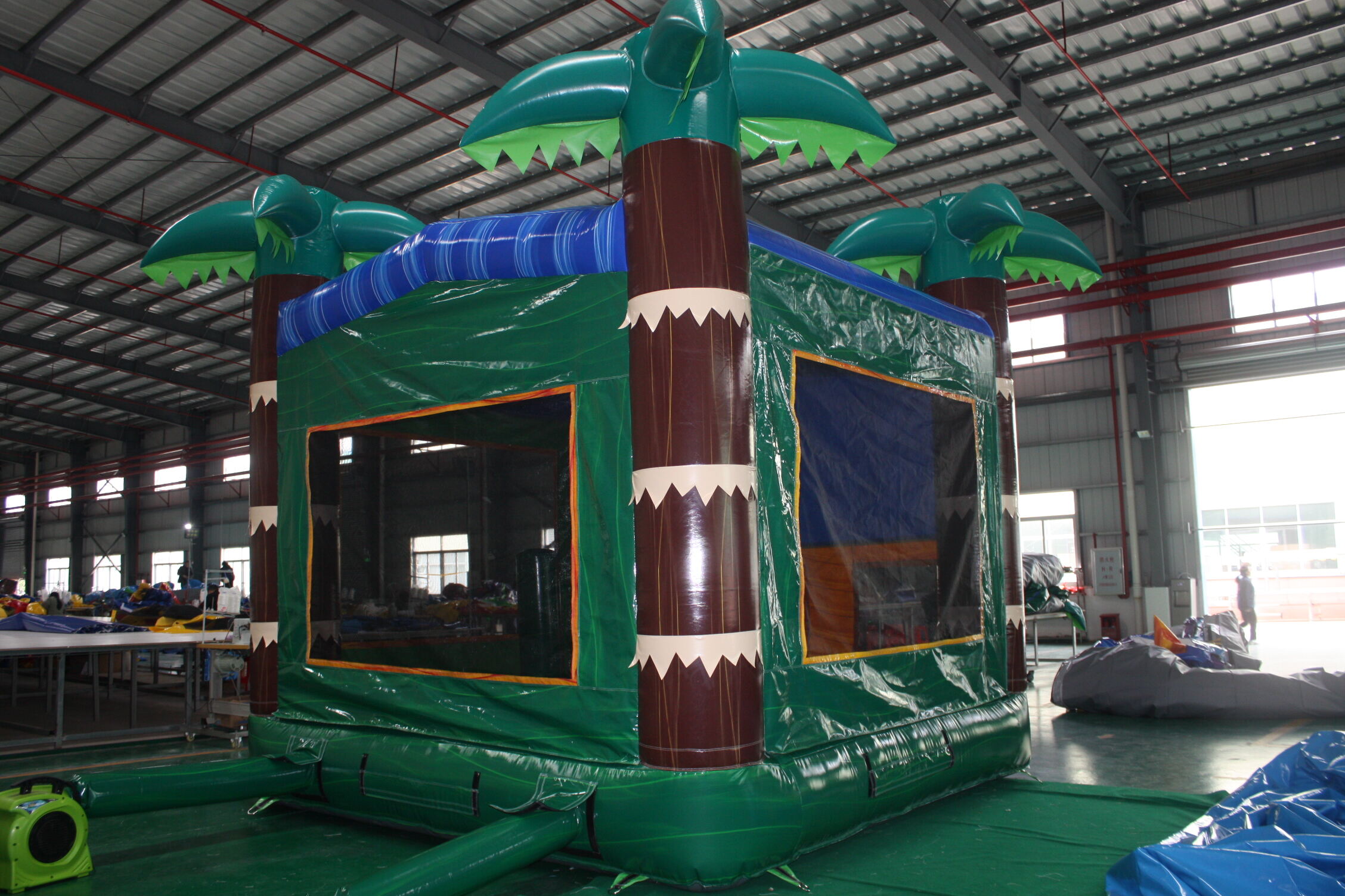In-Stock Iridescent Green Palm Print Inflatable Bounce Bed - Heavy Duty for Hotel Poolside & Beach Club Events