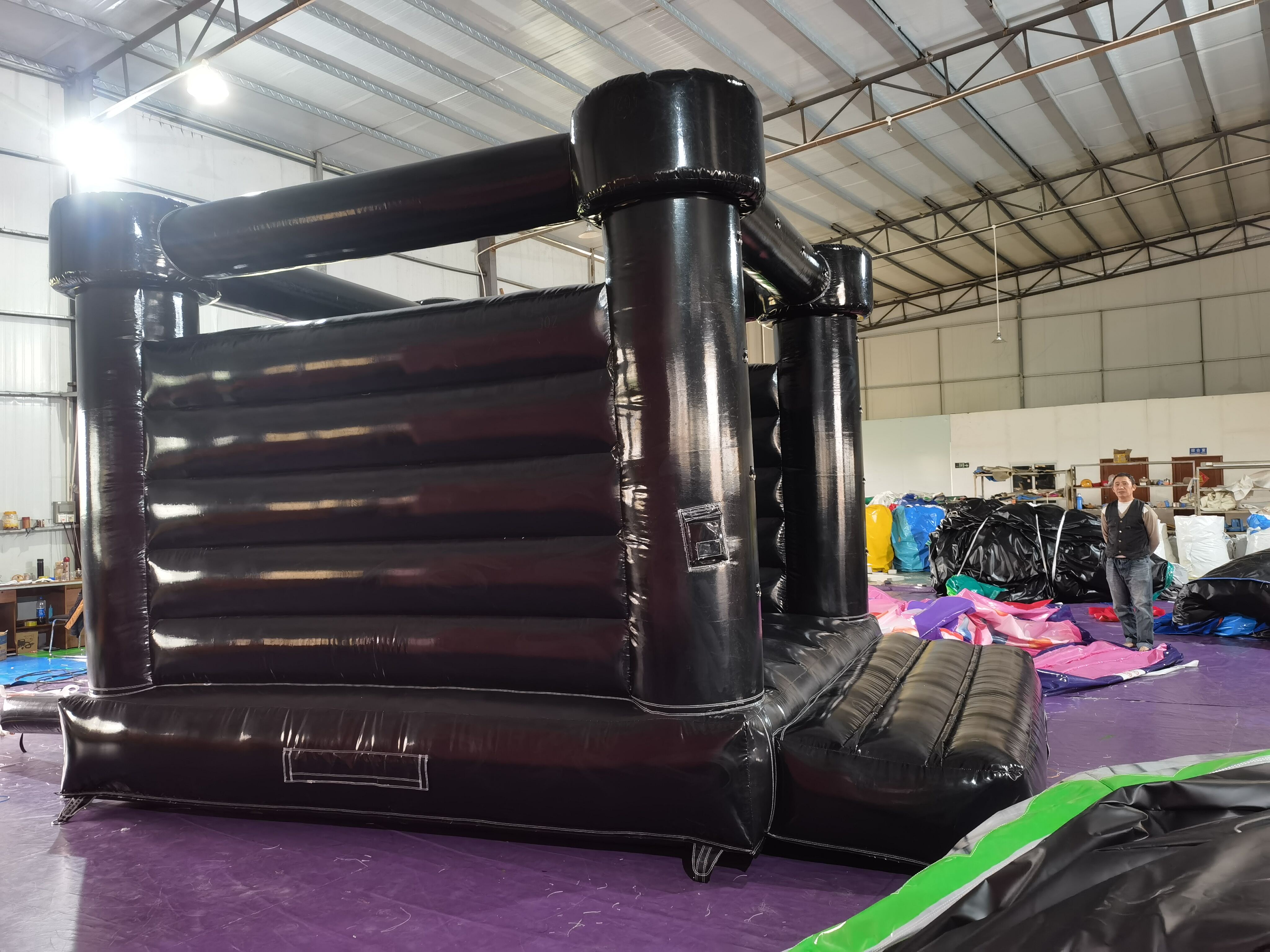 High-End Black Themed Inflatable Bounce House for Intimate Wedding Gatherings