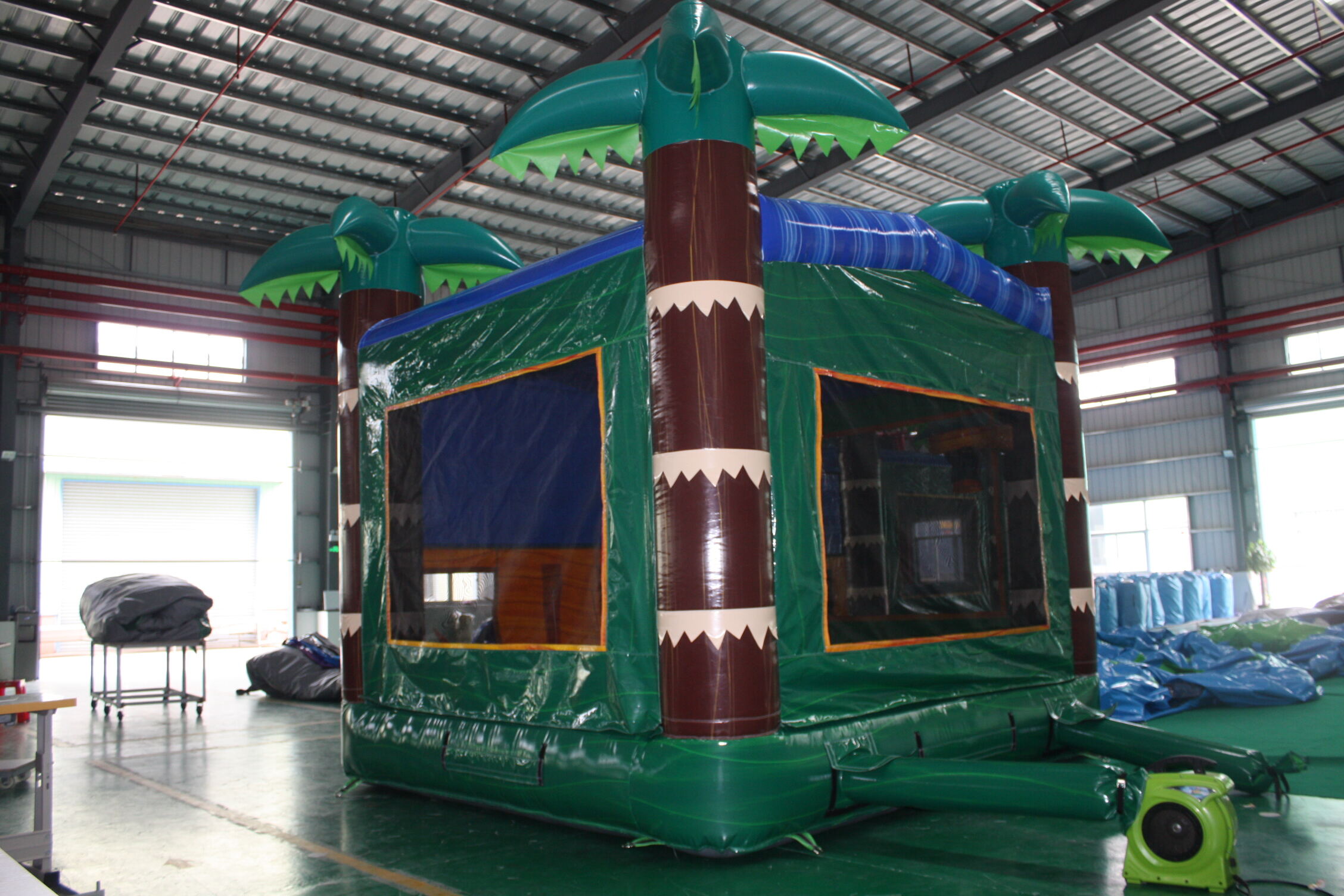 In-Stock Iridescent Green Palm Print Inflatable Bounce Bed - Heavy Duty for Hotel Poolside & Beach Club Events