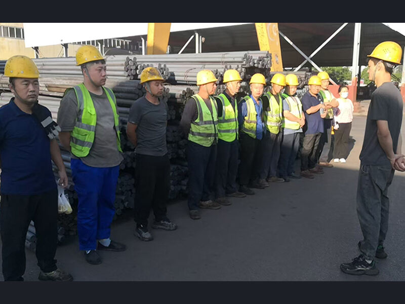 The morning meeting before the company starts work every day