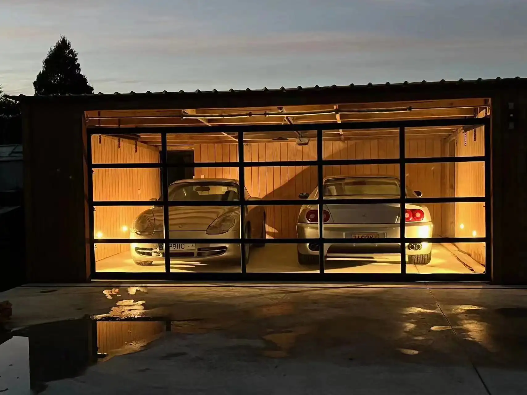How do glass garage doors compare to traditional garage doors?