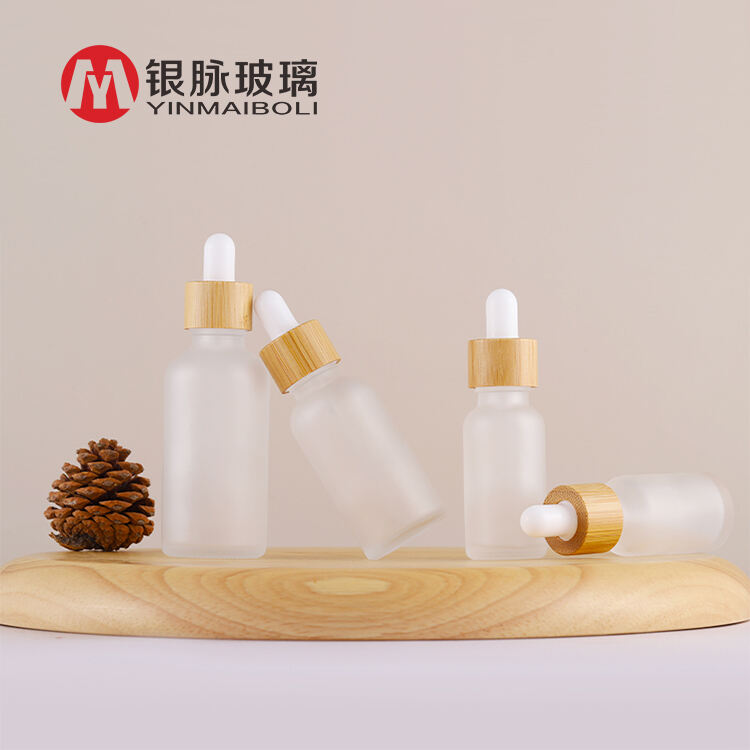 5ml 10ml 20ml 30ml 50ml 100ml Round Glass frosted Essential Oil Bottle With Bamboo Dropper Lid