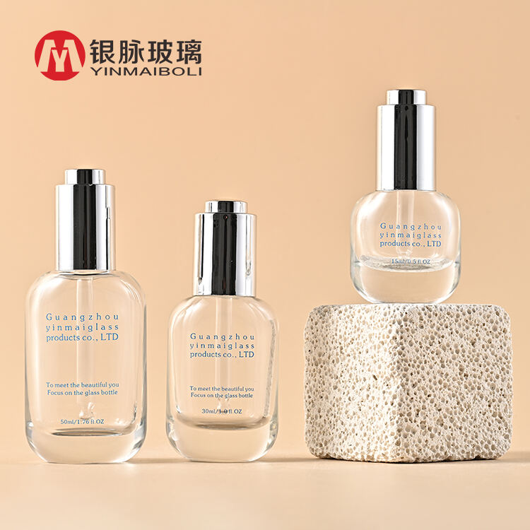 Luxury custom round cosmetic 15ml 30ml 50ml face hair glass serum pump essential oil dropper bottle with box packaging