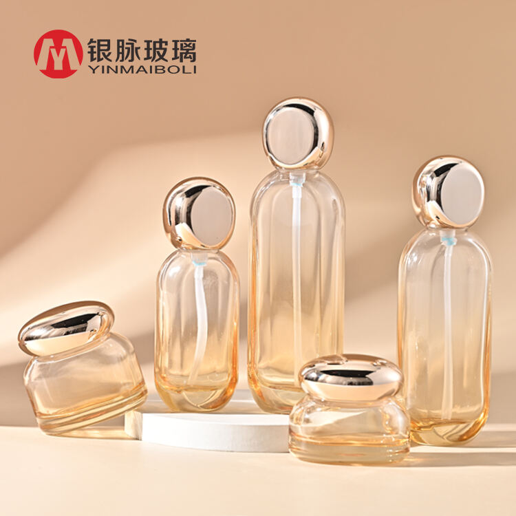 30g 50g 40ml 100ml 120ml luxury cosmetics packaging glass bottle sets gold lid skincare cream jar and pump spray bottle set