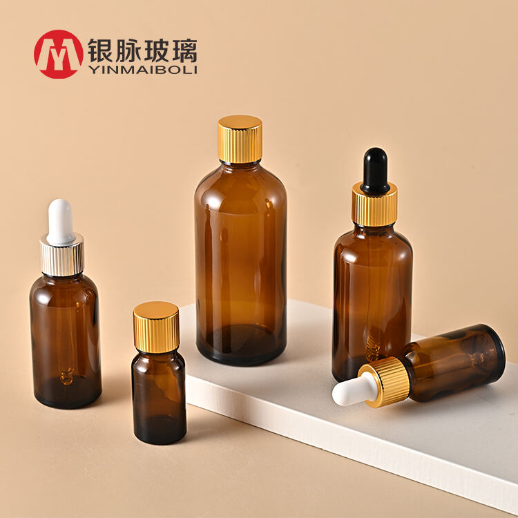 Luxury 0.5oz 1oz 2 oz 10ml 15ml 20ml 30ml 50ml 100ml Amber essential oil facial serum glass gold dropper bottle with gold caps