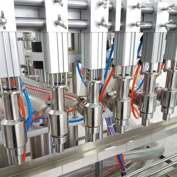 Notre remplisseuse à pompe doseuse liquide 6 postes – Fiable pour l'emballage de liquides