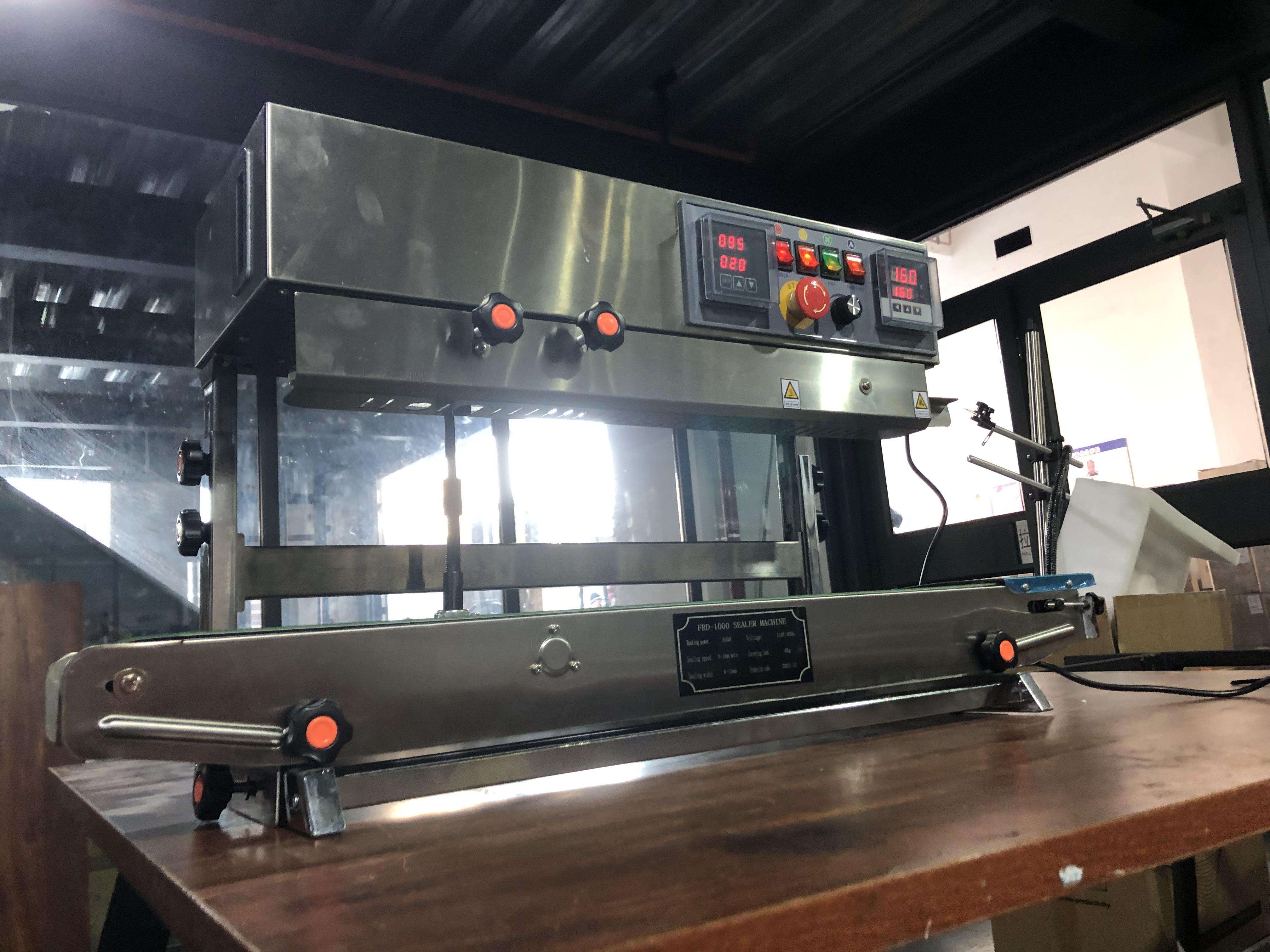 Automatic Continuous Band Sealer with Hot-Stamp Coding manufacture