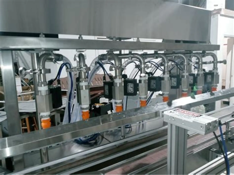 Notre conception de remplisseuse à pompe à engrenages 6Station – Personnalisable et intégrable