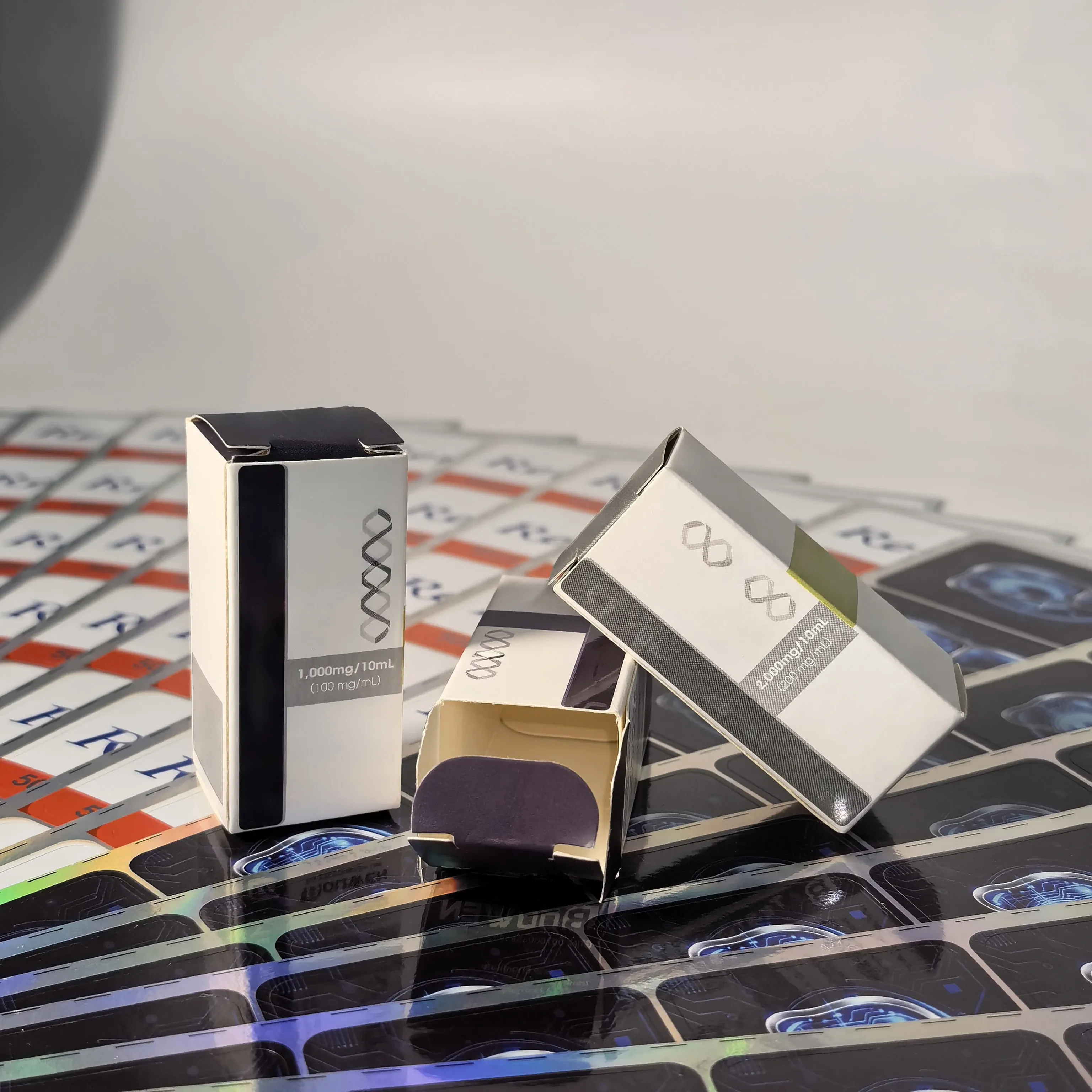 custom holographic foil paper packaging box for 2ml 5ml 10ml empty glass bottles  trays   premium pharma branding display-0