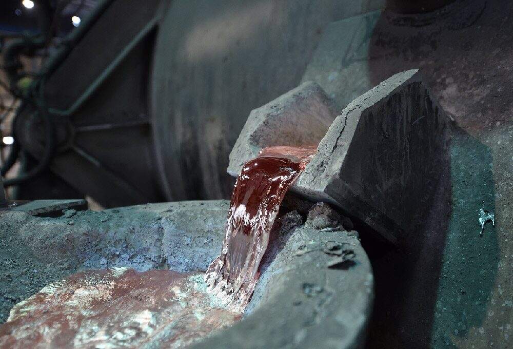 Aluminum alloy melting and impurity control in mass production die casting