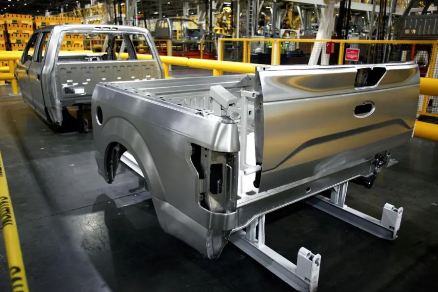 Ford F-150 showing weight reduction from aluminum die cast body components