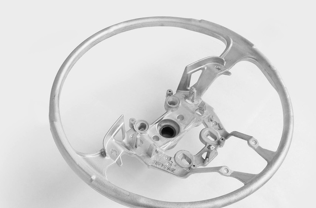 Lightweight magnesium alloy die cast steering wheel frame designed for automotive applications