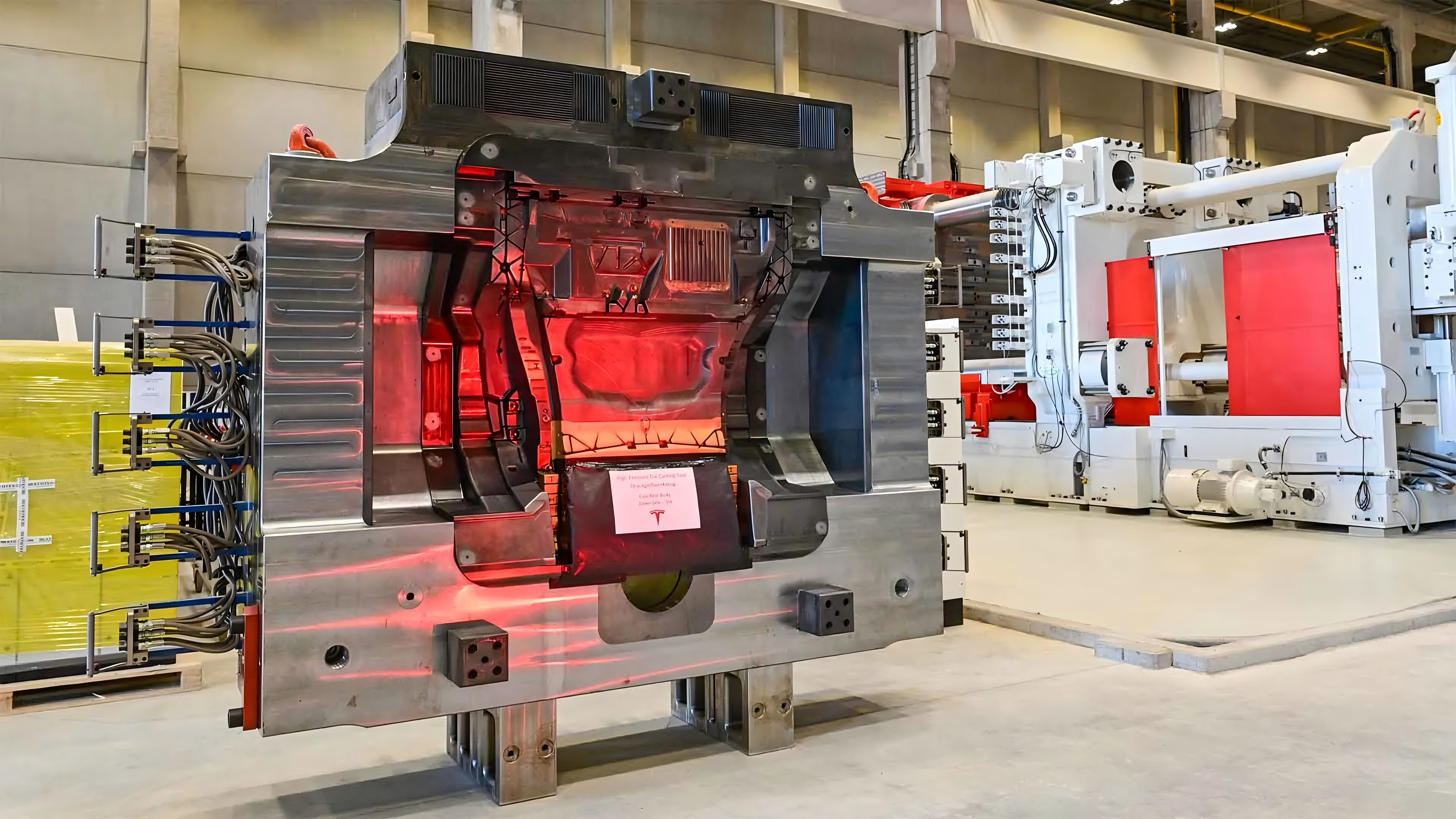 Tesla’s Giga Press die casting machine forming EV components